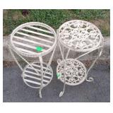 Two white metal plant stands