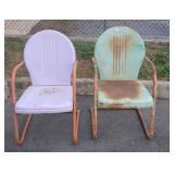 Two outdoor metal lawn chairs