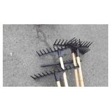 5 plastic and wood handled rakes