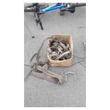 Box of leather horse tack and bit