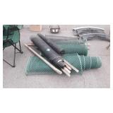 Sections of black and green snow fence, seller