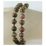Two unakite bead silvertone stretch bracelets