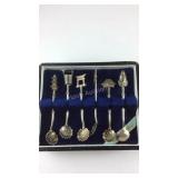 Six mini Sterling silver Japan collector spoons