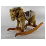 Chrisha Playful Plush rocking horse, needs spot