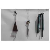 Three wind chimes, one with birdhouse (19"), one