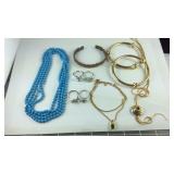 Jewelry, floral silvertone rings, blue beaded