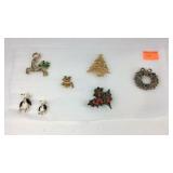Seven brooches Christmas theme