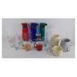 Group of drink ware, glass and  plastic