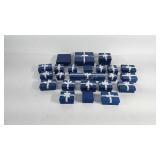 24 jewelry boxes of various sizes, most with bows