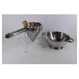 Two Stainless steel kitchen items, colander and