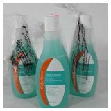 Four bottles of Sally Hansen moisturizing nail