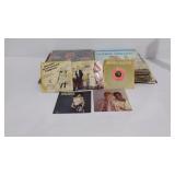 Group of vinyl albums, mostly Spanish language,