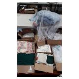 Skid lot of textiles, bedspreads, towels,
