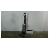 Dyson DC40 vaccuum with attachments, powers on,