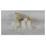 Tupperware containers, juice pitcher, condiment