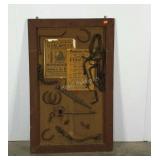 Framed and mounted Old West ephemera, horseshoes,