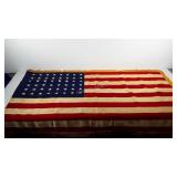 American Flag, needs cleaned, has tear on upper