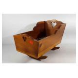 Wooden doll cradle with heart detailing, 23" ×