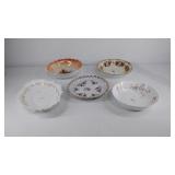 Five porcelain bowls, marked Austria, Prussia and