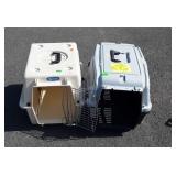 Two pet carriers, one missing door