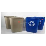 Two Rubbermaid trash cans and two Rubbermaid