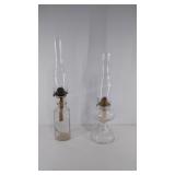 Two glass oil lamps