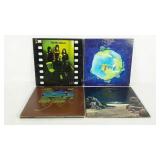 Yes, 4 vinyl record albums