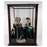 Porcelain dolls, three porcelain dolls in