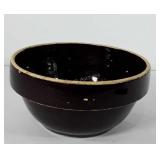 Stoneware mixing bowl with brown glaze, has chips