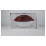 Wilson football in collectors case, signed by