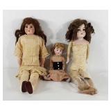 Vintage German dolls, two with leather bodies,