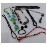 Group of costume jewelry, 7 necklaces, bracelet,