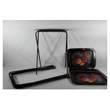 Set of four Crestline floral toleware TV trays,