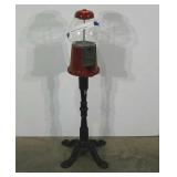 Working gumball machine, cast iron base, glass