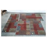 Set of 4 matching rubber backed rugs, sizes as