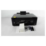 Epson printer, with black ink cartridge, powers