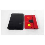 Two tablets with cases, no power cords, untested