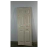 Closet door, 2 panels each measuring 15 x 80