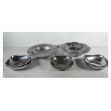 Two large salad bowls and five Wilton armetale