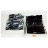 Two dozen pairs of assorted sunglasses, new with