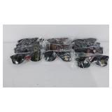 Eleven pairs of new sunglasses, black and