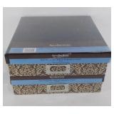 Two unopened paper storage boxes for 12x12