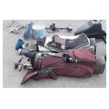 Two Golf Club Bags with assorted Clubs, used