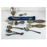 Silverplate spoons, brass decor, lock and key,