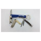 Cork opener and two small pocket knives