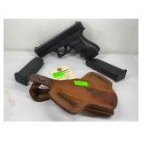 Glock model 23 40 caliber pistol.   3 magazines