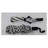 Two collapsible umbrellas