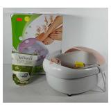 Foot massager in box, unused, includes bag of tea