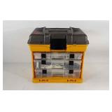 Plano toolbox full of security system components,