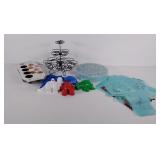Group of candy molds, cookie cutters, cupcakes